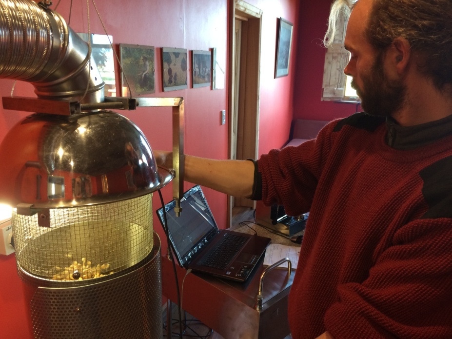 Cyriel hand roasting the coffee beens